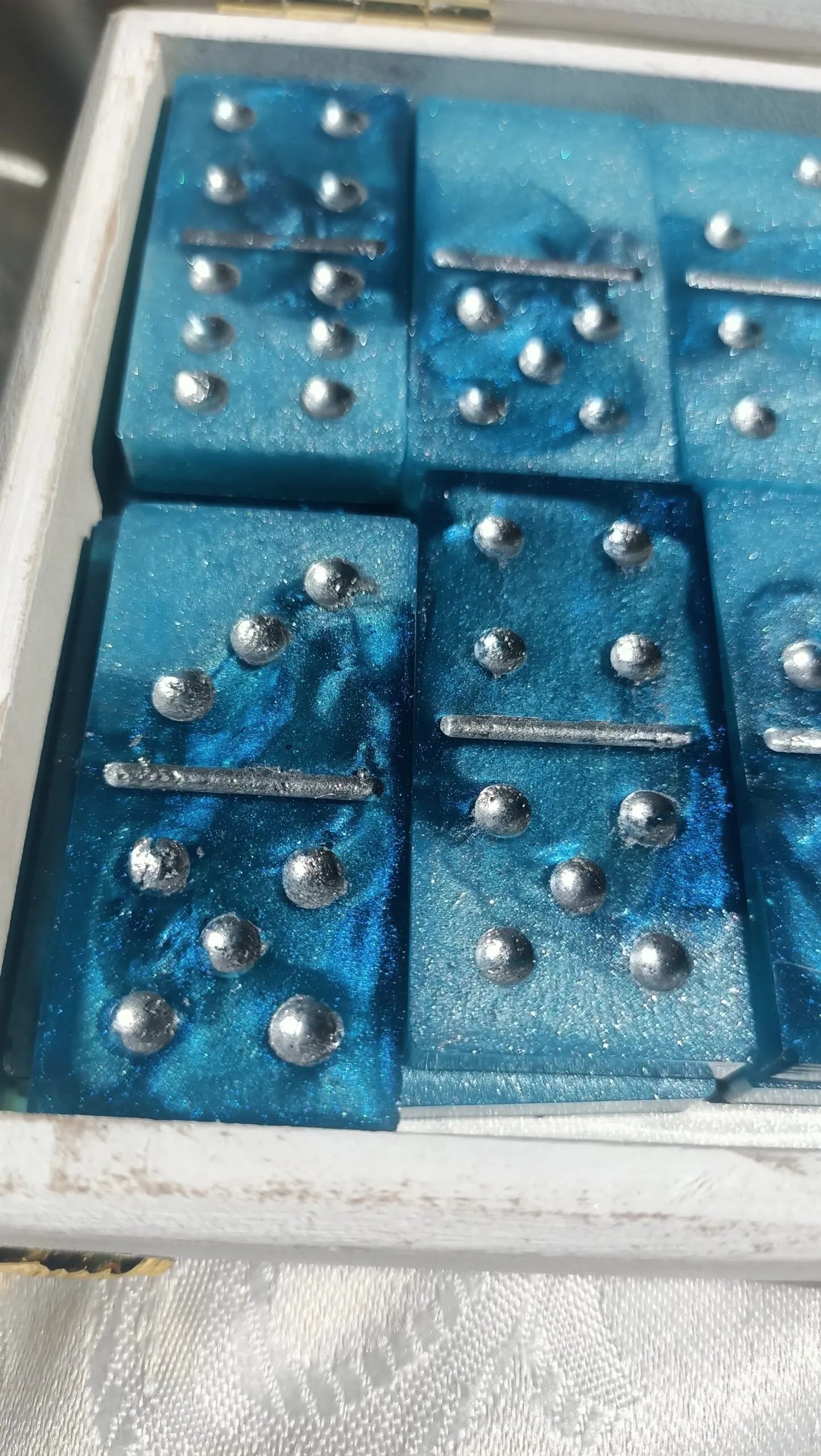 دومينو ريزن بدرجات أزرق