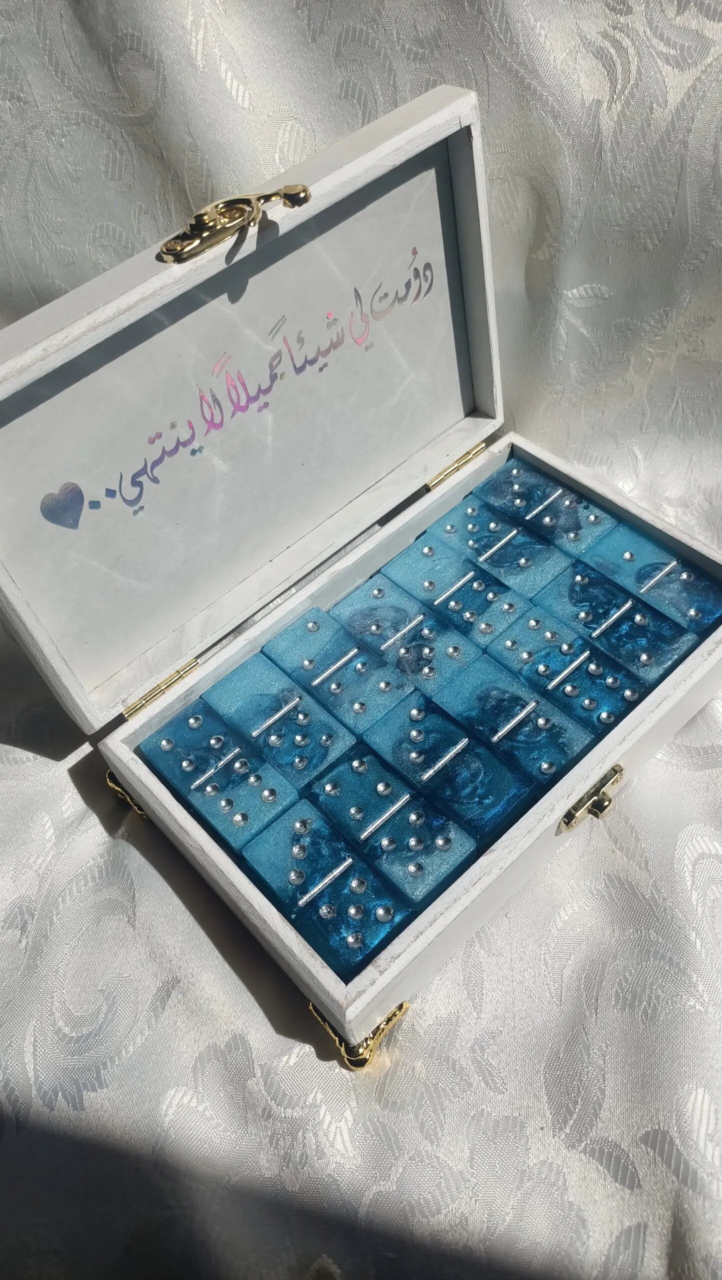 دومينو ريزن بدرجات أزرق